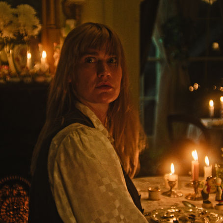 Still from Honey Bunch showing Grace Glowicki in a tense, clinical setting.