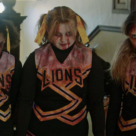 Scene from The Spirit of Halloweentown documentary, showcasing the residents of St. Helens, Oregon celebrating their spooky legacy.