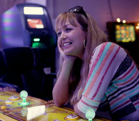 Interior of a small strip mall casino with fish arcade gambling machines in Clovers documentary.