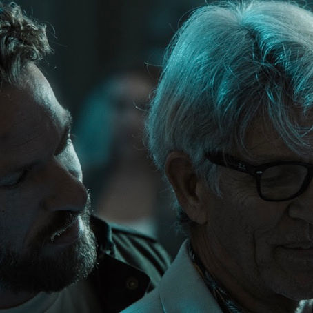 Rosslyn Luke in a tense sci-fi scene from Recollection, set in a dystopian 2033.