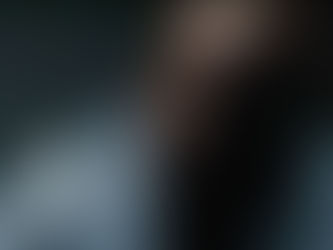 Tyrese Gibson and Max Martini in a shootout scene from Hollywood Grit, set in a moody jazz club district.