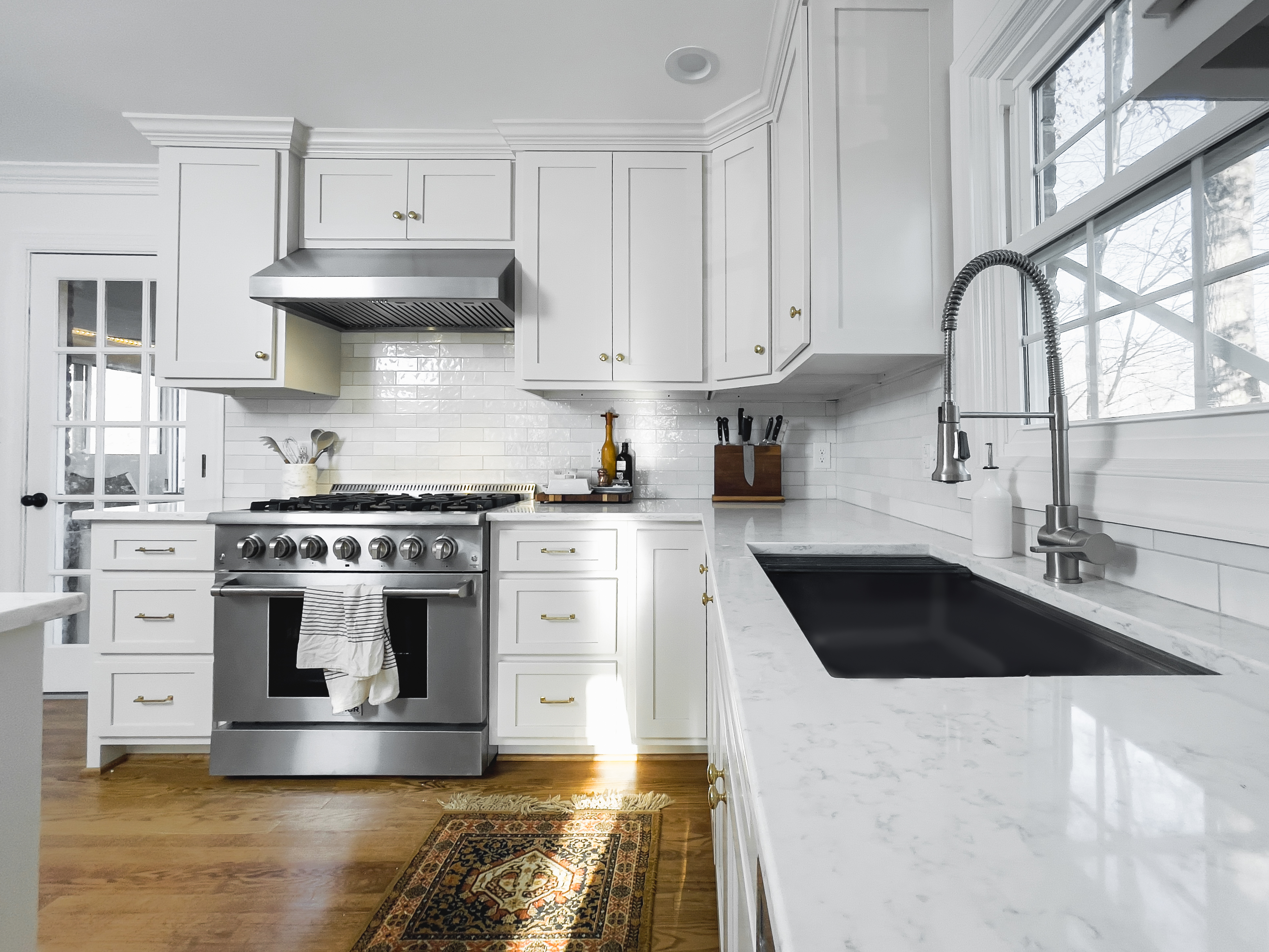 Custom kitchen remodel with new cabinetry and countertops by Atlas