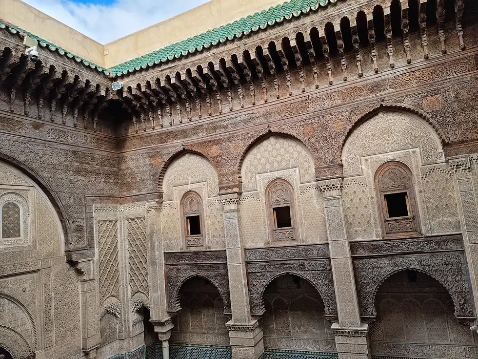 Close-up view of the intricate tile work at the Medersa el-Attarine