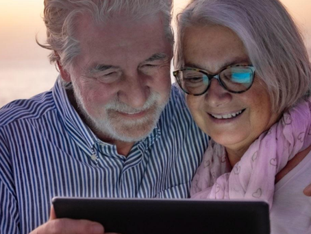 a retired couple on a beach thinking about their legacy
