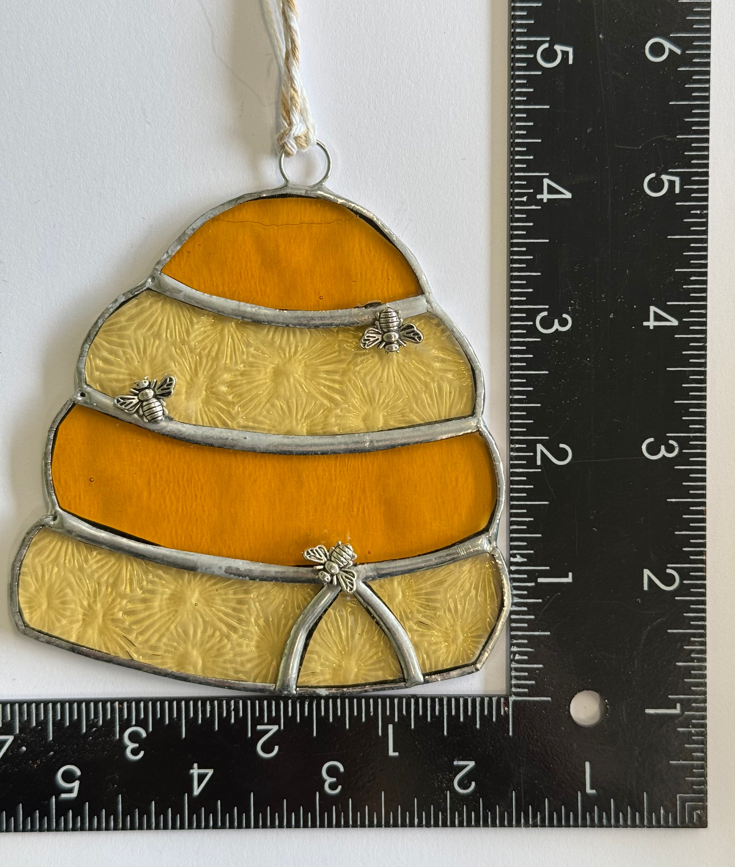 Beehive with metal bees