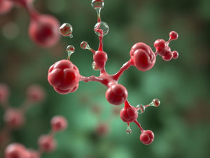 Close-up of red molecular structure with glossy spheres, set against a blurred green background, conveying a scientific theme.