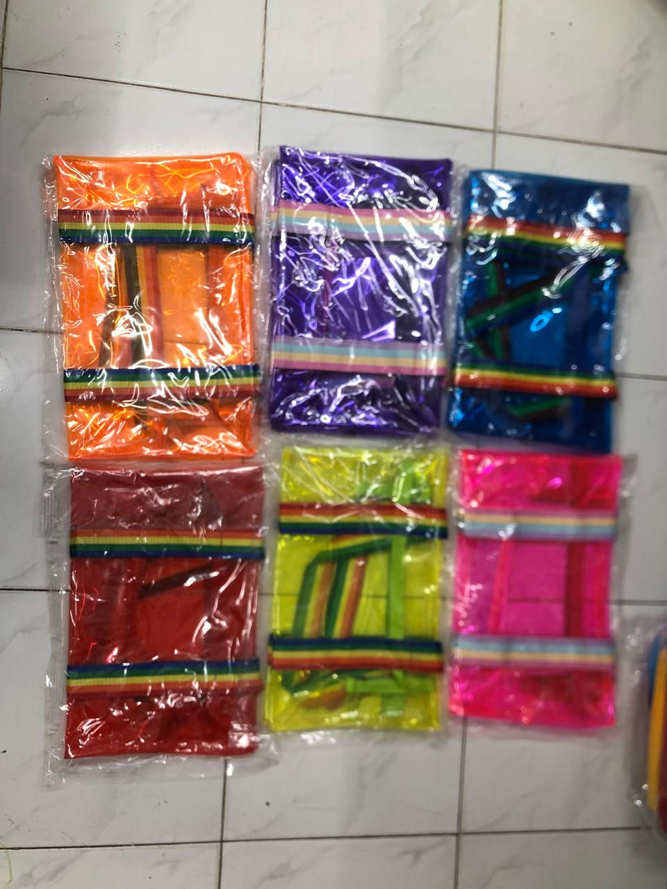 Thumbnail: Six colorful rainbow tote bags