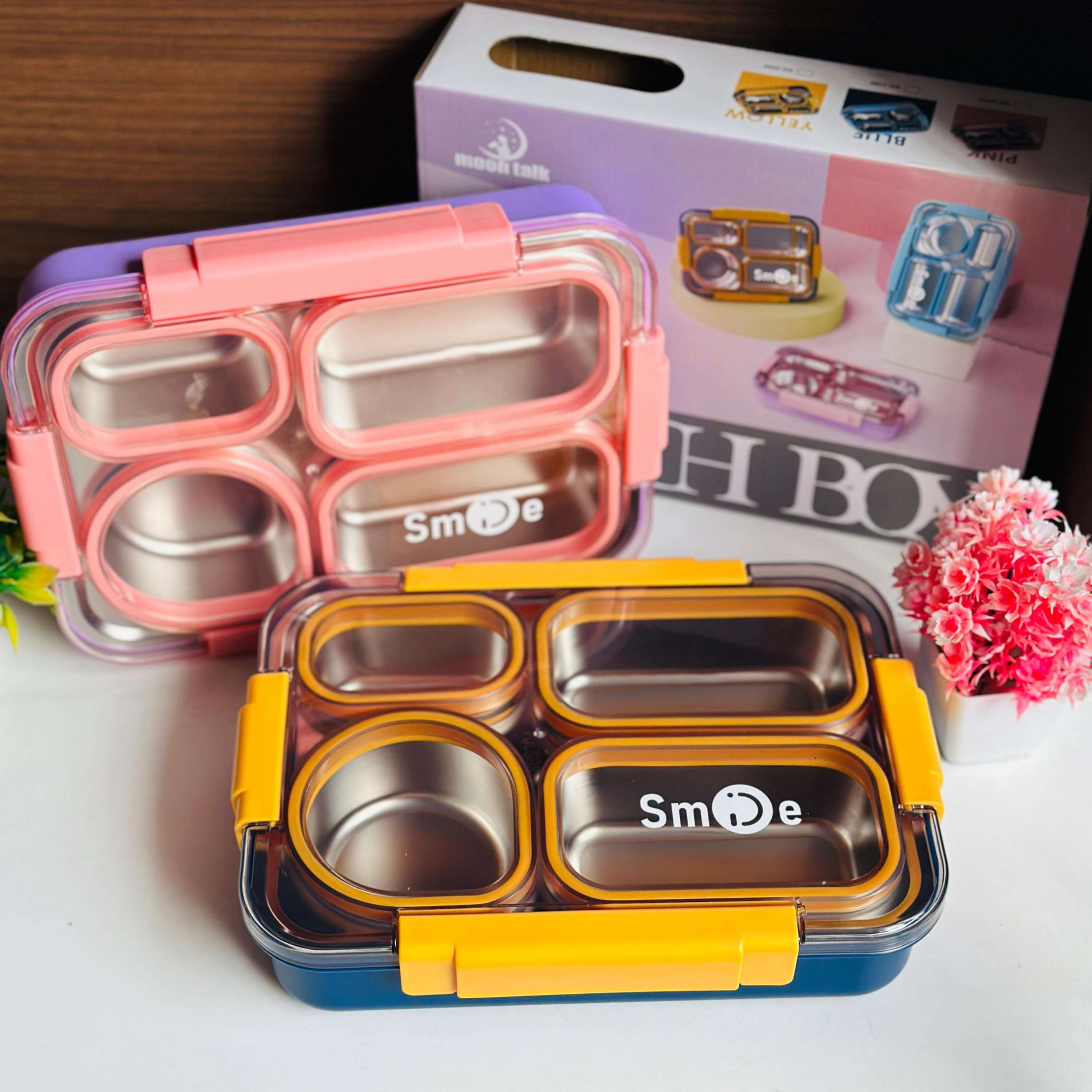 Pink and yellow Smoo lunch boxes