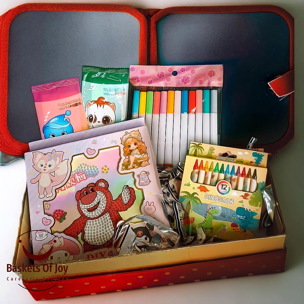 Colorful stationery set in a red box: crayons, markers, and more