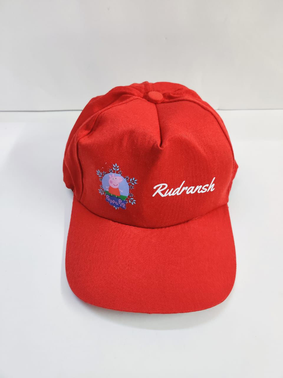 Thumbnail: Red Rudransh baseball cap with Peppa Pig logo