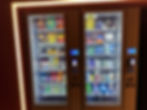Vending machine stocked with snacks and drinks