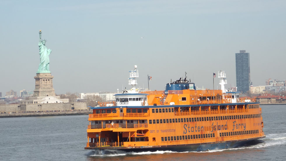 The free Staten Island ferry with the Statue of Liberty in the background