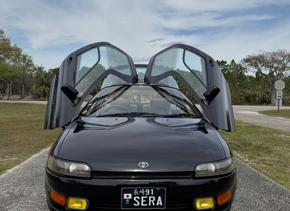 1991 Toyota Sera for sale – right-hand drive (RHD) JDM import car with automatic transmission, featuring an original black exterior and unique design.