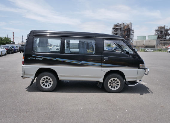 Driver side profile of 1998 Mitsubishi Delica Star Wagon Active World 4WD imported from Japan with turbo diesel engine