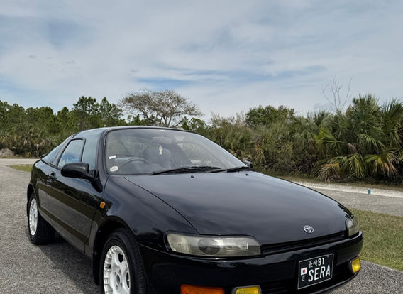 1991 Toyota Sera for sale – right-hand drive (RHD) JDM import car with automatic transmission, featuring an original black exterior and unique design.