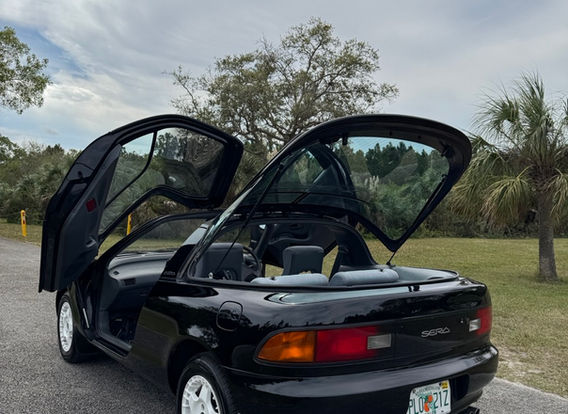 1991 Toyota Sera for sale – right-hand drive (RHD) JDM import car with automatic transmission, featuring an original black exterior and unique design.
