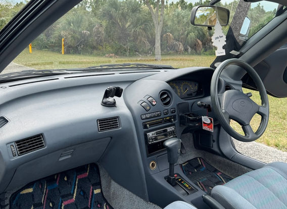 1991 Toyota Sera for sale – right-hand drive (RHD) JDM import car with automatic transmission, featuring an original black exterior and unique design.
