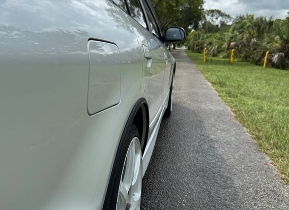 1997 Mitsubishi Legnum VR-4 Type S for sale – White Pearl exterior, Black Leather interior, AWD, 2.5L twin-turbo V6, automatic transmission, ABS, airbags, power windows, and air conditioning. A rare and high-performance sports wagon in excellent condition.