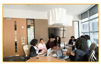 women in a meeting.png