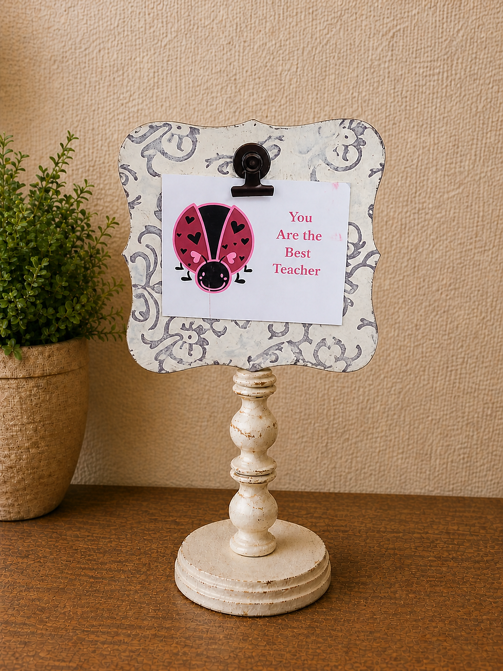 Rustic desktop message and photo stand holding card with clip and decorative metal backing