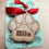 Thumbnail: Personalized wooden paw-shaped Christmas bauble