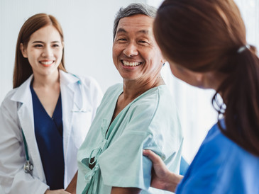 Doctor & nurse with patient