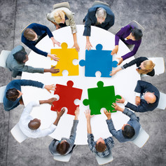 People putting puzzle together