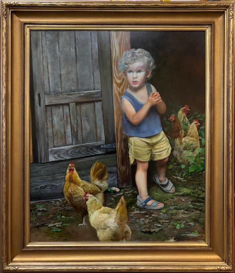 portrait of a little boy surrounded by chickens