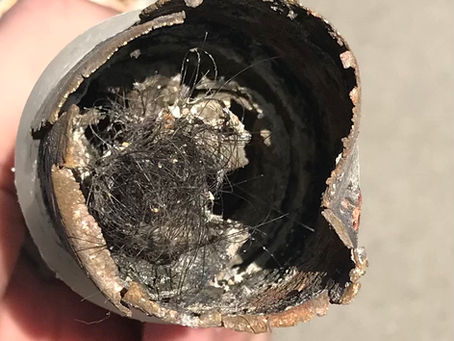 Clogged Drain: One Hair At A Time