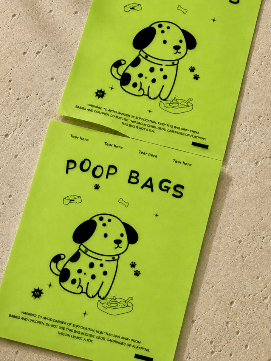 Thumbnail: Trail Bags™ dog waste bags in green packaging with illustrated dog design