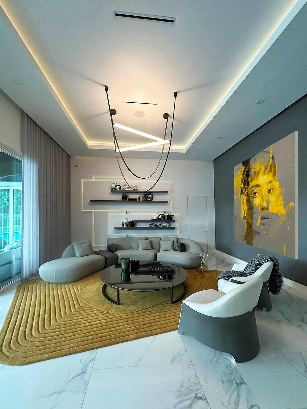 Eye-level view of modern open floor plan living room with natural light