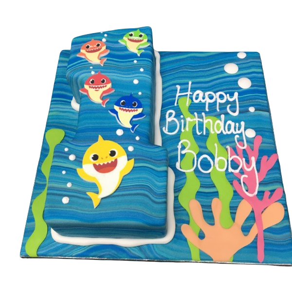 A cute and colourful Baby Shark themed cake with the number 1 on top, perfect for a fun and charming celebration.