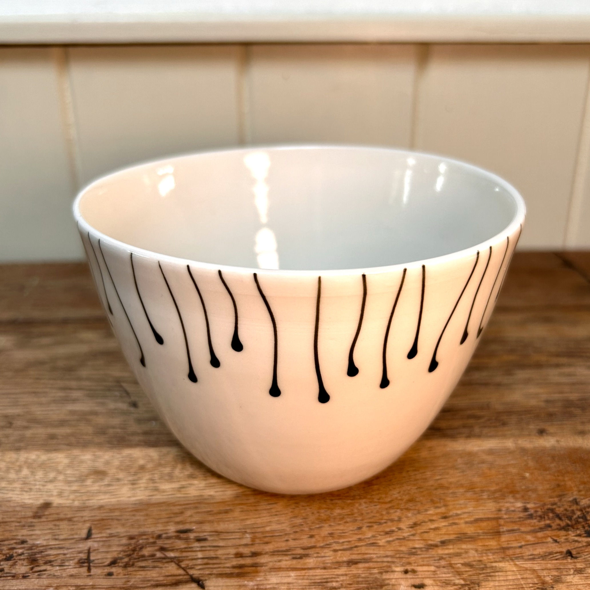 small white bowl with drip decoration