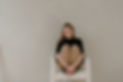 This image is a photographer sitting in a chair.