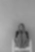 This is a photo of a woman sitting in a chair getting her photo taken
