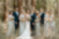 A bridal party poses for the camera in Bend, Oregon for photos during a wedding.