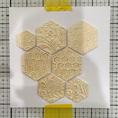 Hexagons adhere to white background