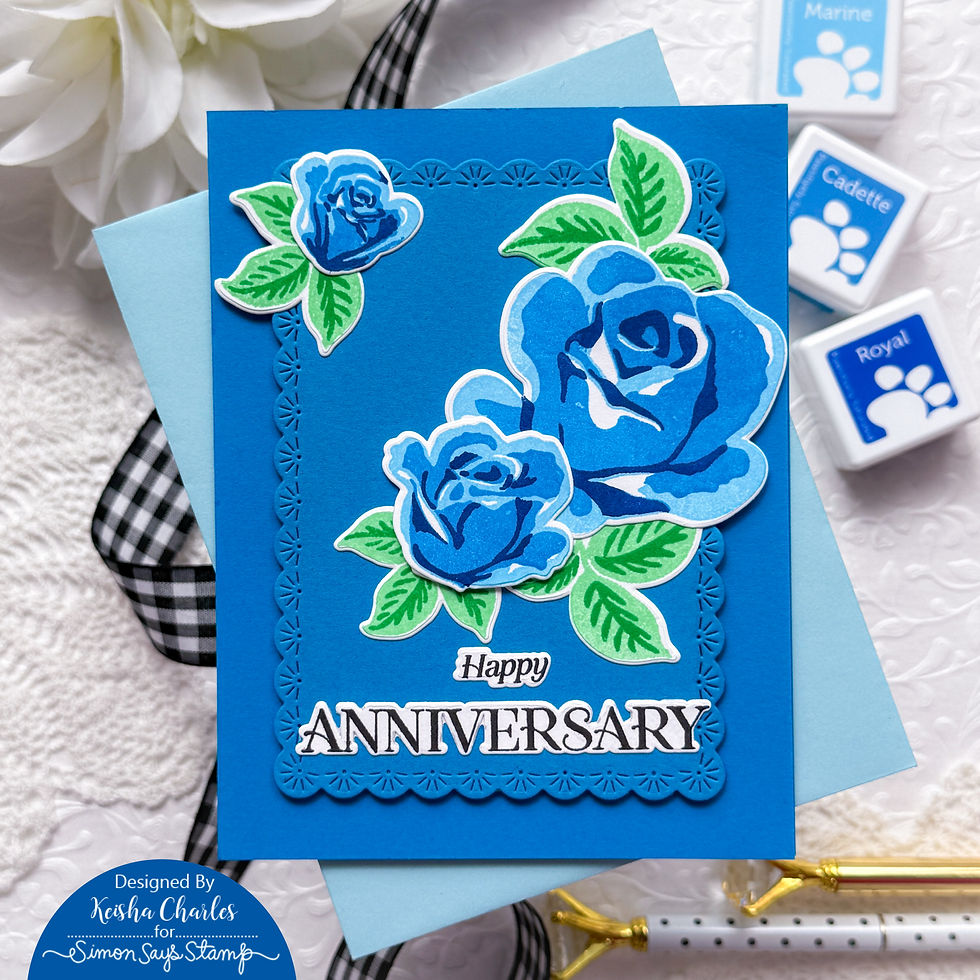 Blue handmade anniversary card with layered blue roses and green leaves; reads Happy ANNIVERSARY.