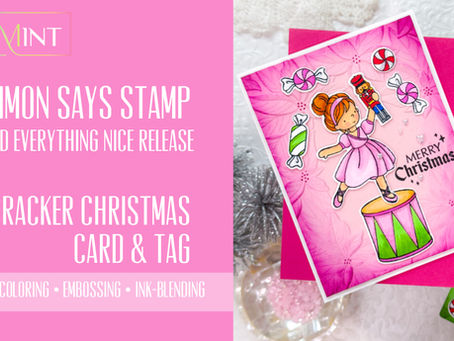 Simon Says Stamp Nutcracker Christmas card with a pink ballerina holding a nutcracker on a drum. Other decorations include candy and "Merry Christmas" text.