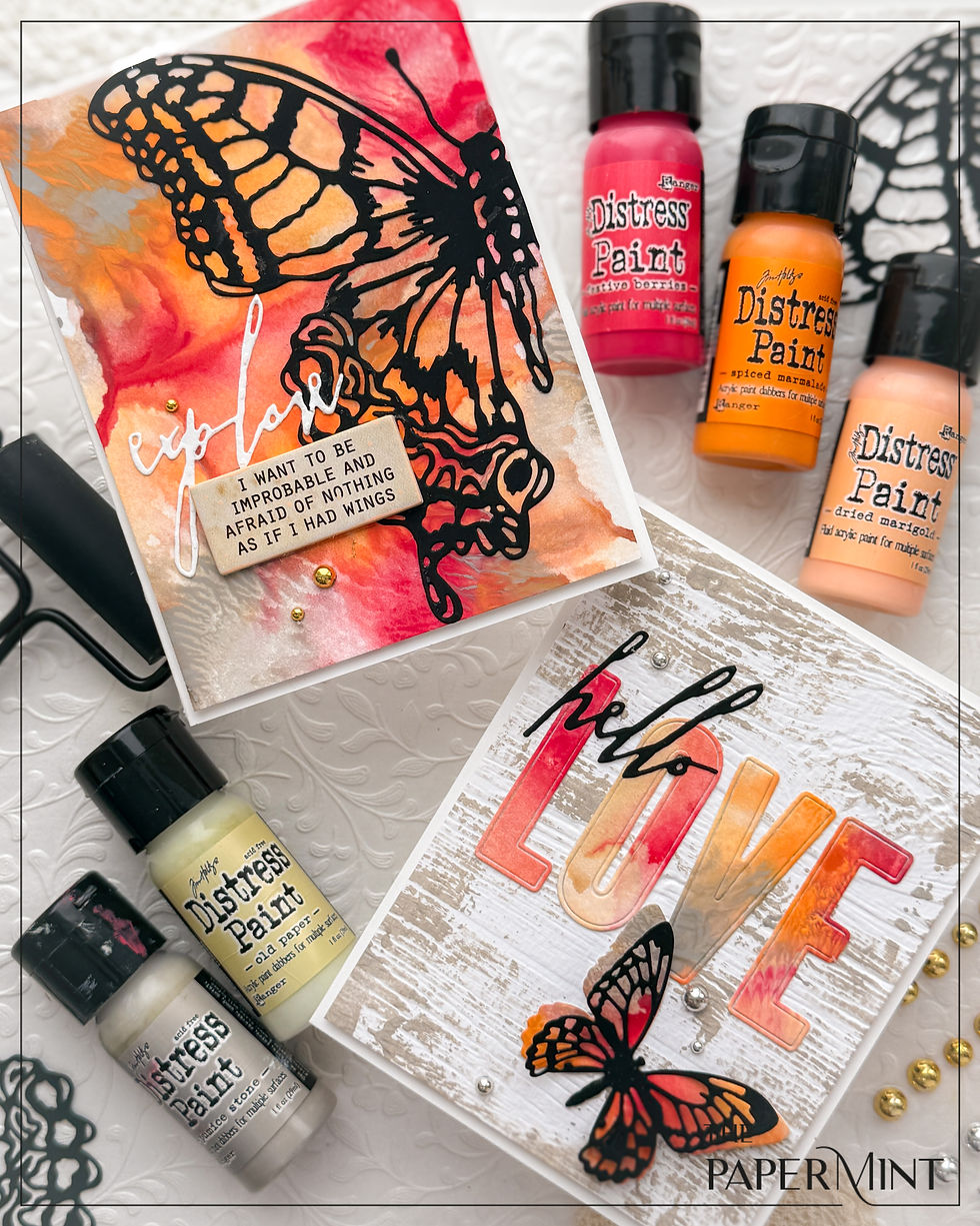 Butterfly-themed cards with vibrant Distress Paints. One card reads "I want to be improbable" and "hello LOVE." Paint bottles and pearls decorate.