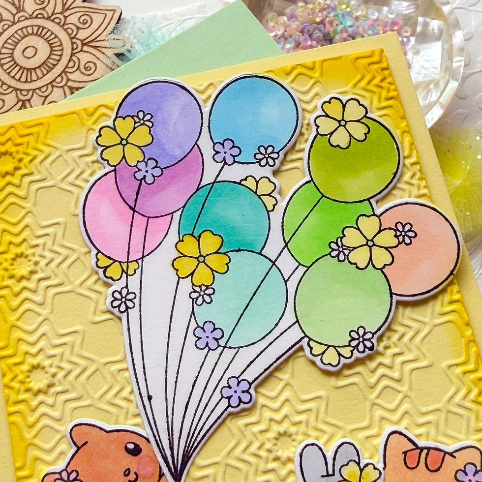 Pastel balloon bouquet card with flower stickers on a yellow star-embossed background; cute, cheerful craft scene.
