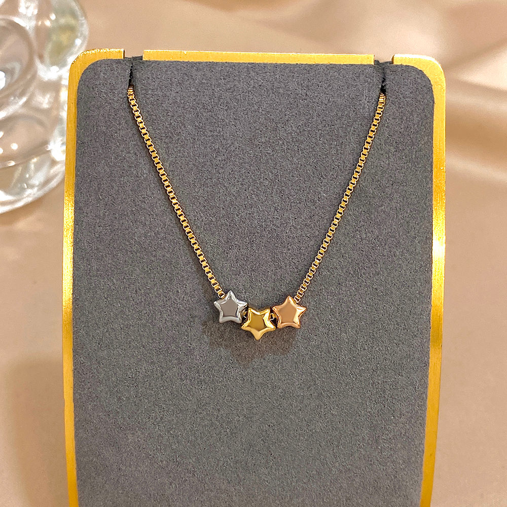 TriStar™ Mixed-Metal Star Necklace