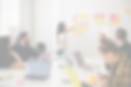 woman placing sticky notes on wall_edite