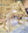 The Romney — bespoke oak porch with curved-underside tie beam and queen truss