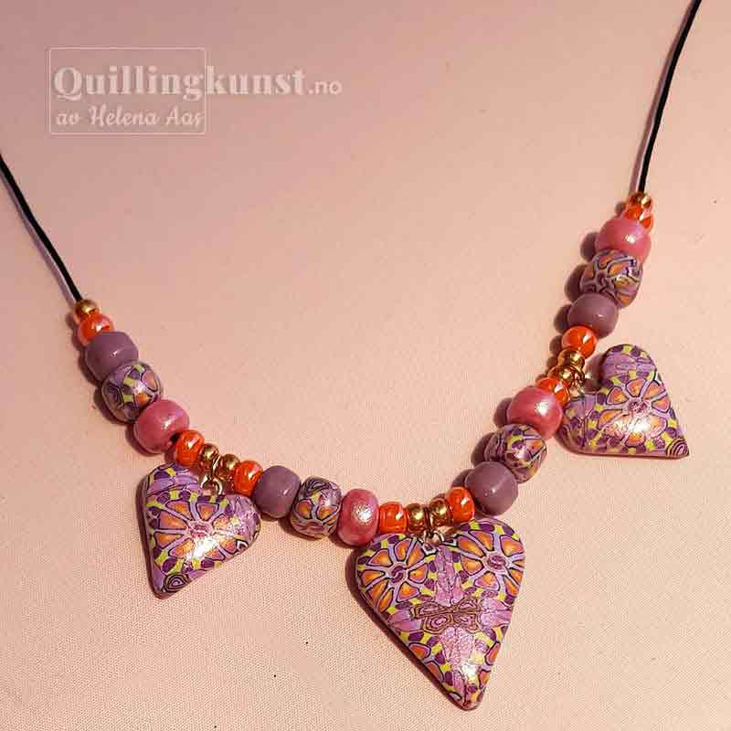 Miniatura: Collier Kaleidoskop med rosa hjerter.