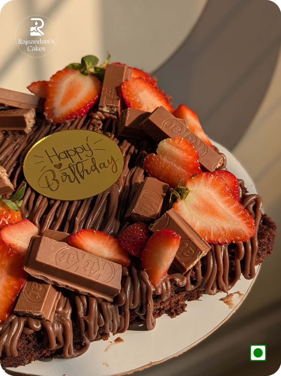 Fudgy chocolate brownie birthday cake loaded with fresh sliced strawberries and KitKat bars topped with Nutella by Rajnandani