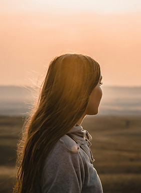 Woman overlooking mountains