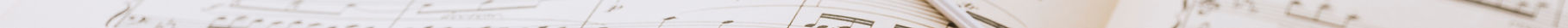 Conductor's baton on sheet music