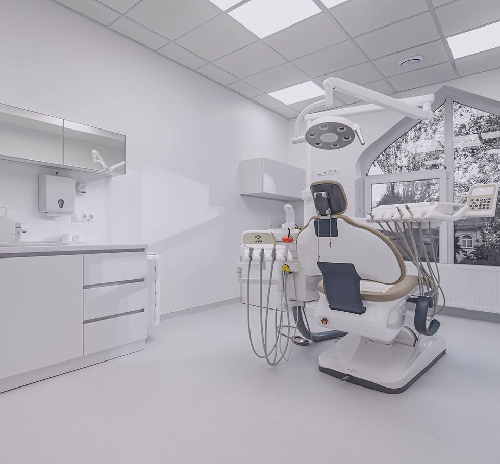 Interior of white dental surgery medical room with special equipment.jpg