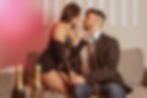 A woman dressed seductively tries to initiate intimacy with her surprised partner illustrating how cultural myths about desire affect relationships discussed by a Psychologist in Orange County specializing in Couples Therapy.
